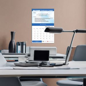 Modern office interior with blue accents and desk facing window